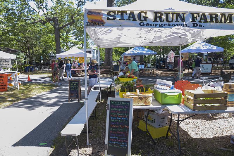 Stag Run Farm uses benches to keep the distance from customers.